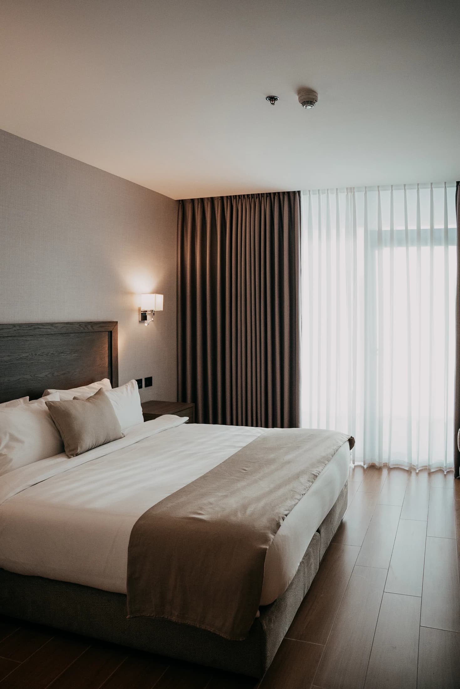 Guest room with sheer curtains