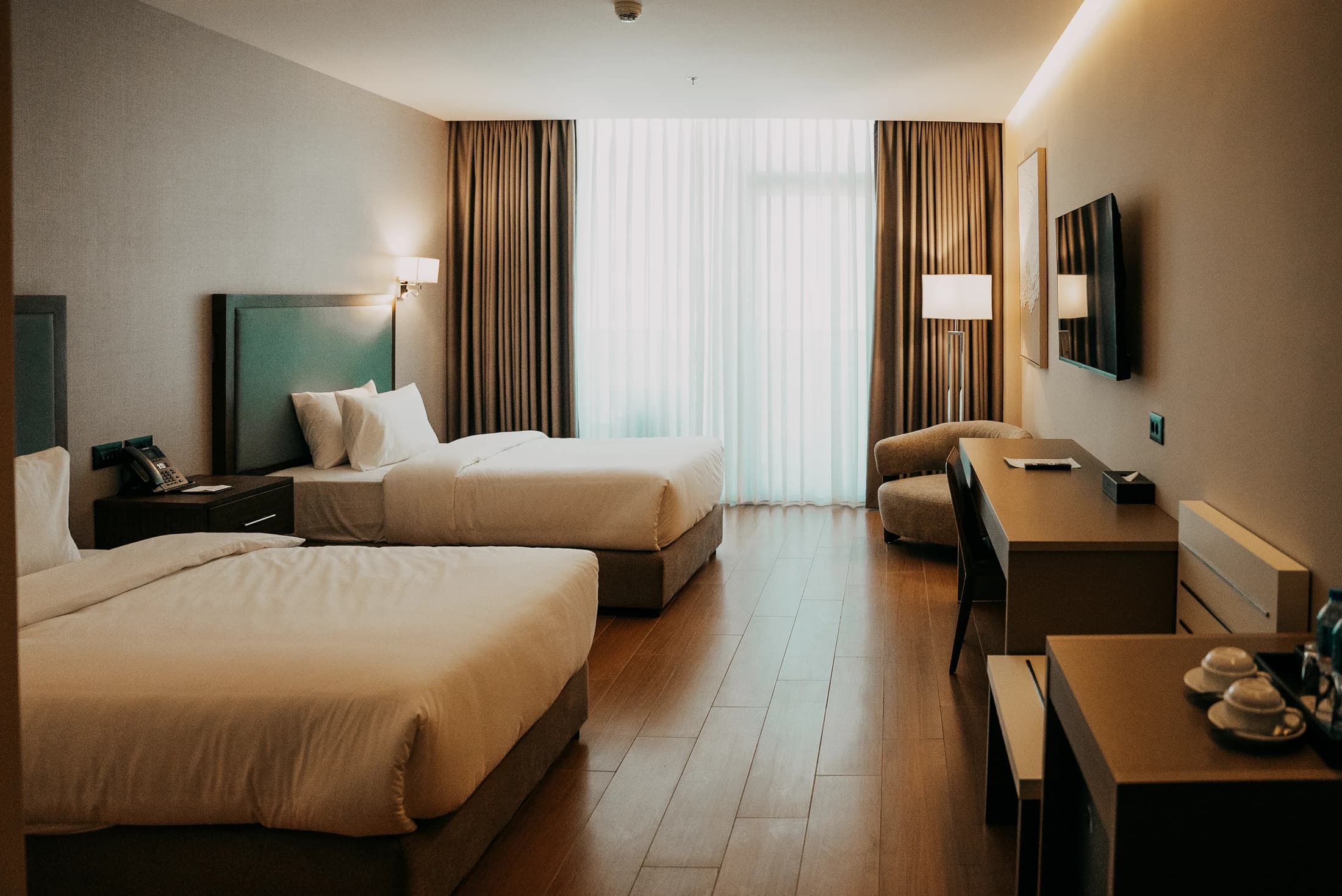 A guest room in warm evening light