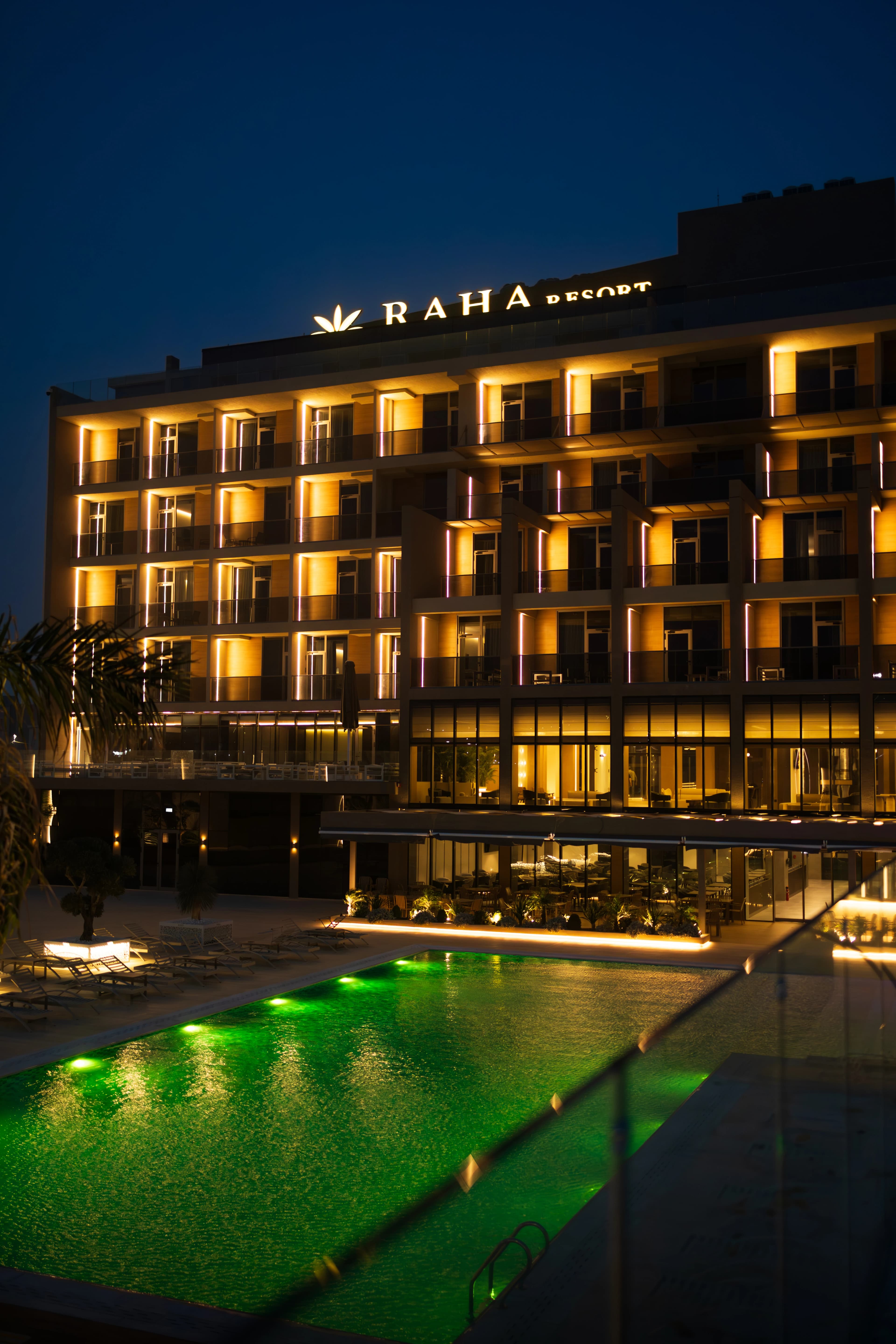 Lit facade logo at night